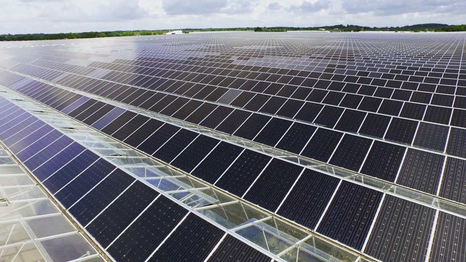 Aerial close-up of a paneled greenhouse roof
